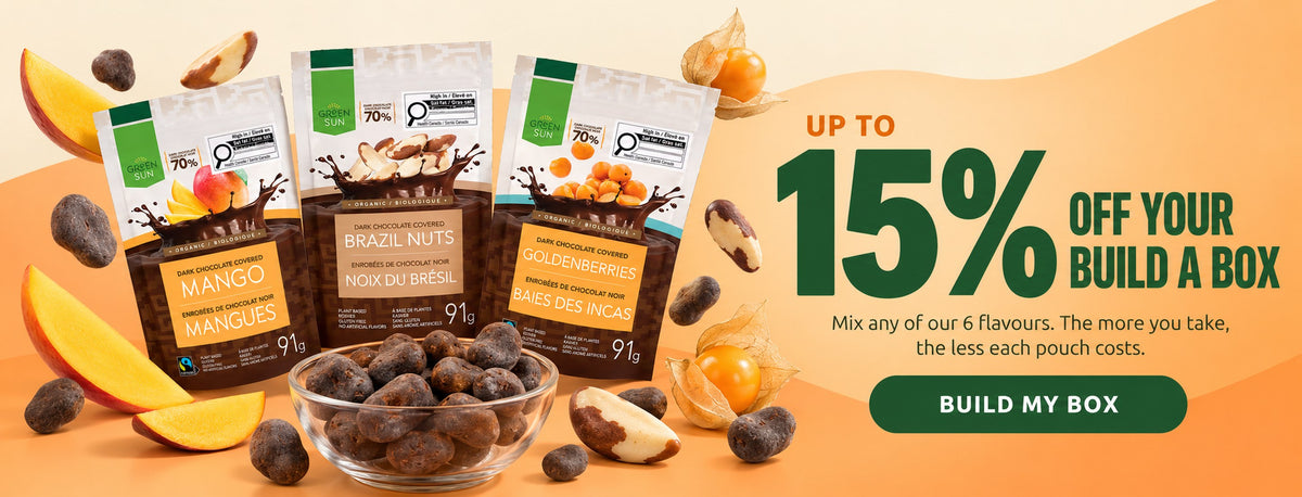 Up to 15% off your Build a Box: Green Sun mango, Brazil nut and goldenberry pouches with a bowl of dark chocolate covered fruit and nuts