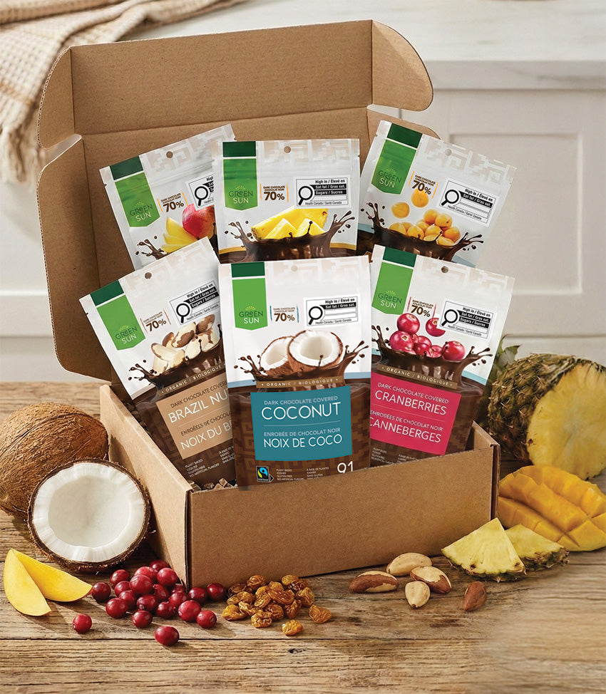 Green Sun Build-a-Box organic dark chocolate fruit snack assortment including mango, pineapple, coconut, cranberries, brazil nuts and goldenberries.