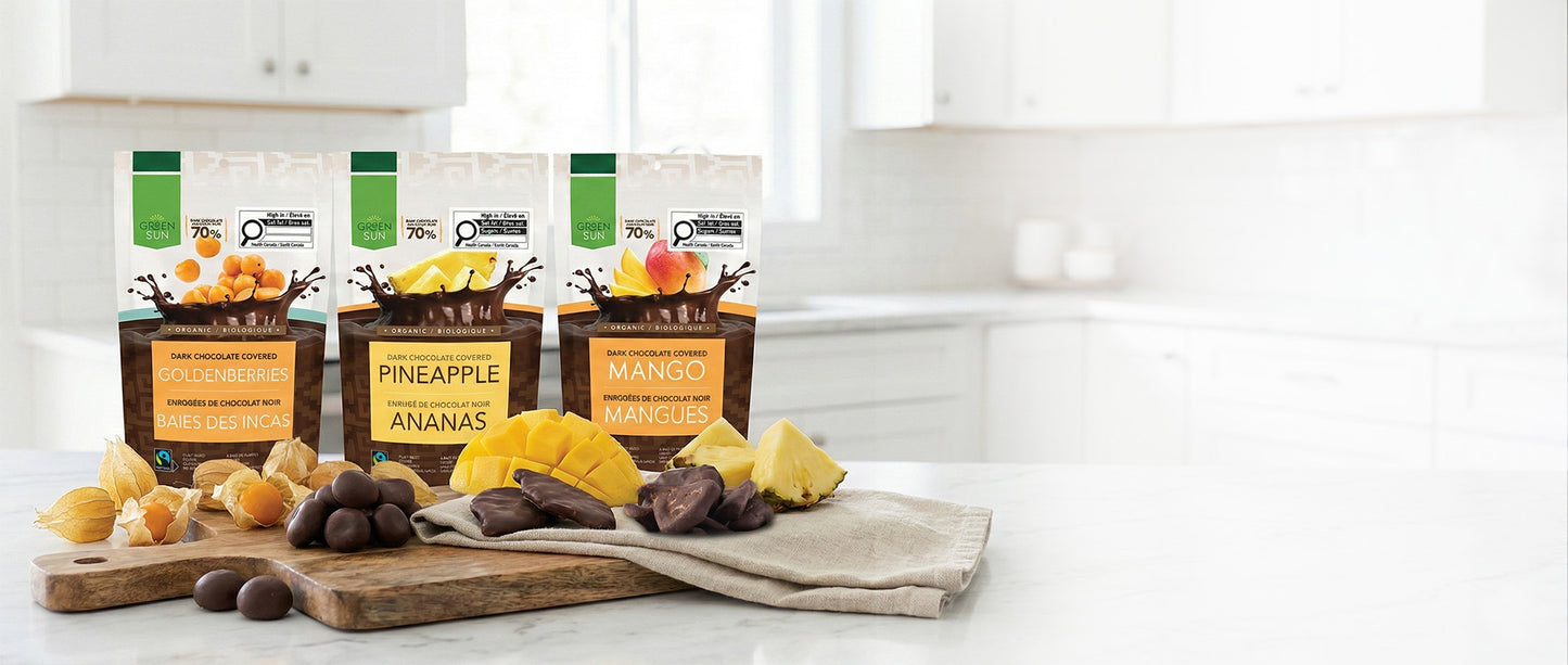 Green Sun organic dark chocolate snacks featuring goldenberries, pineapple and mango made with 70% Peruvian cacao.