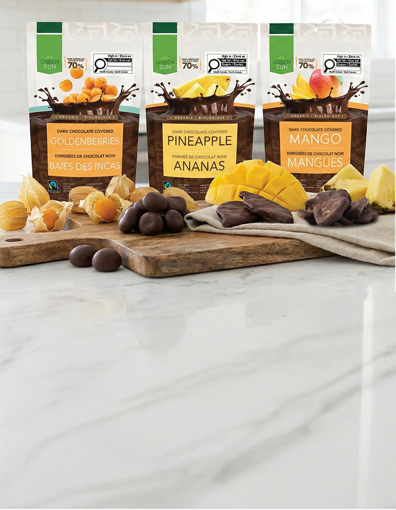 Green Sun organic dark chocolate snacks featuring goldenberries, pineapple and mango made with 70% Peruvian cacao.