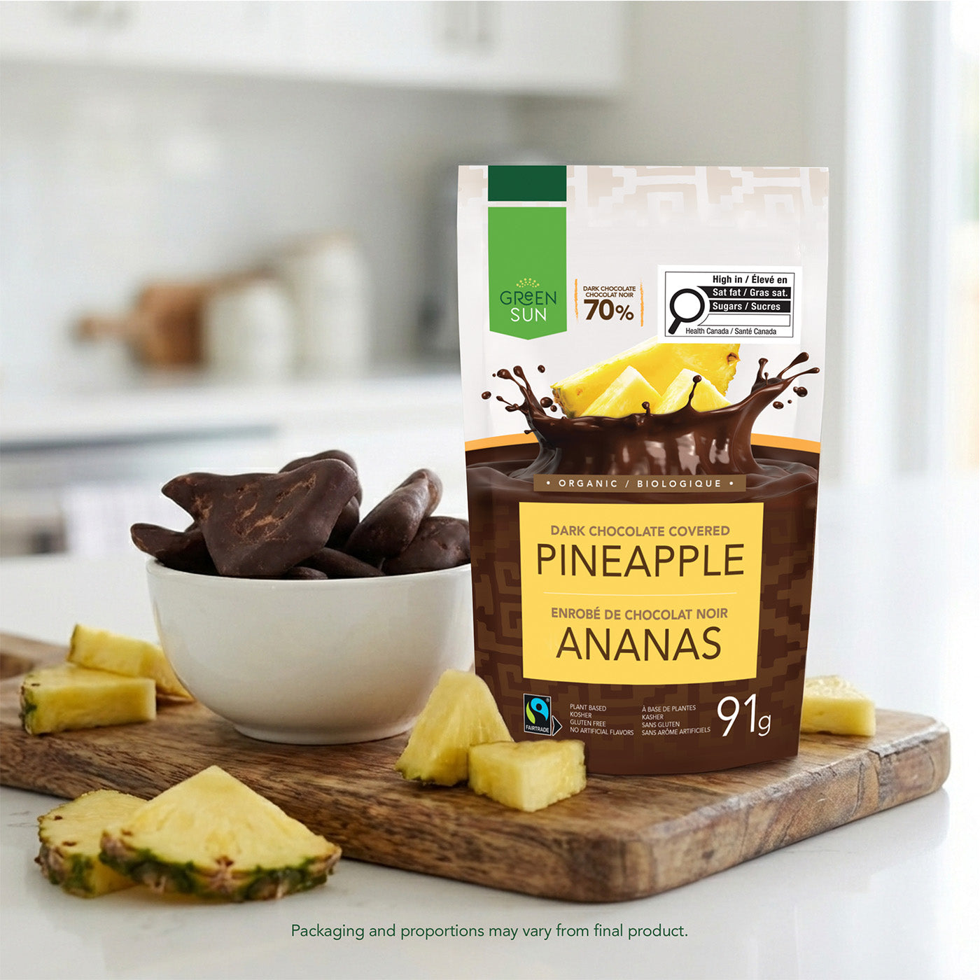Dark chocolate covered pineapple with Green Sun packaging and real pineapple