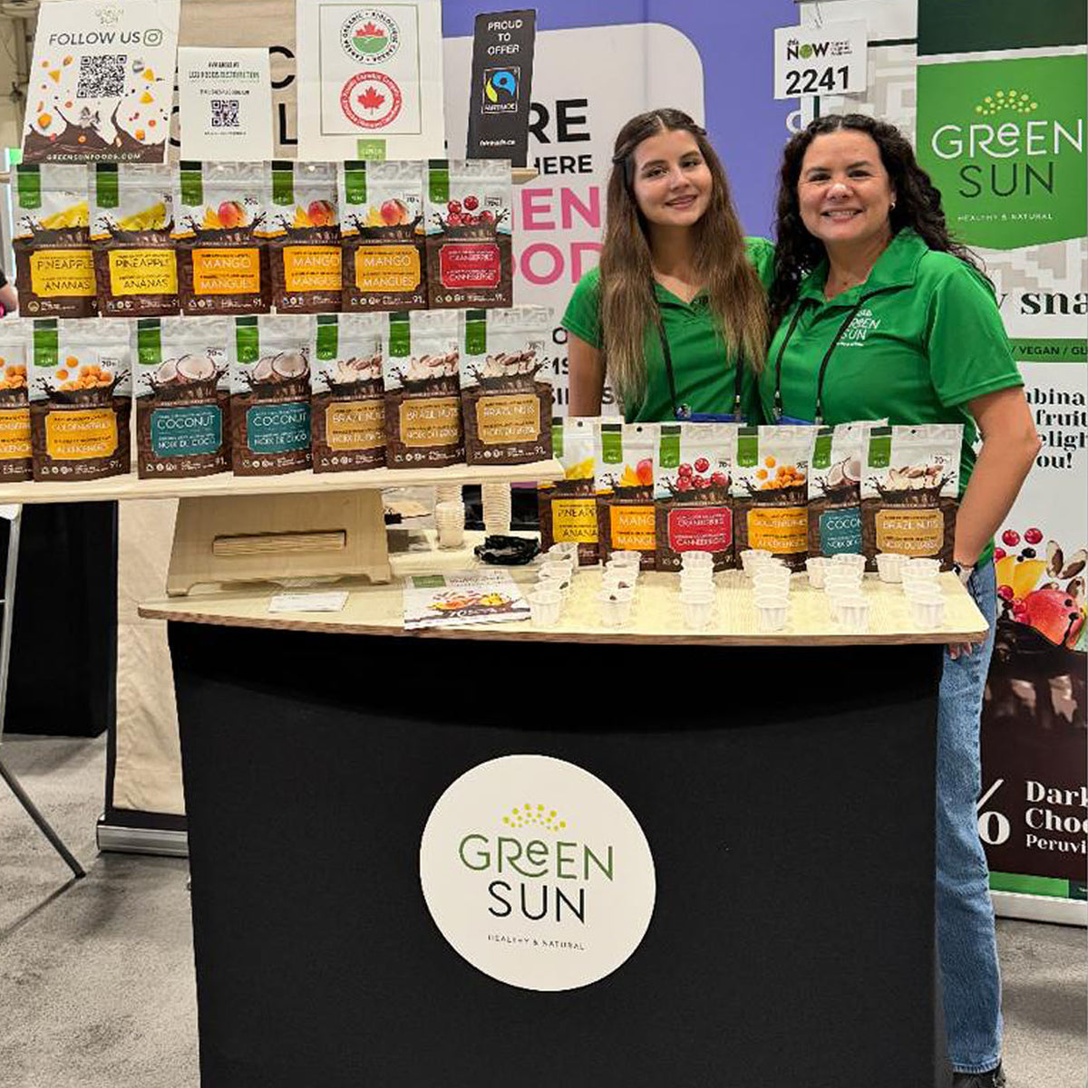 Green Sun founder and team member hosting a product tasting demo showcasing women-owned business values
